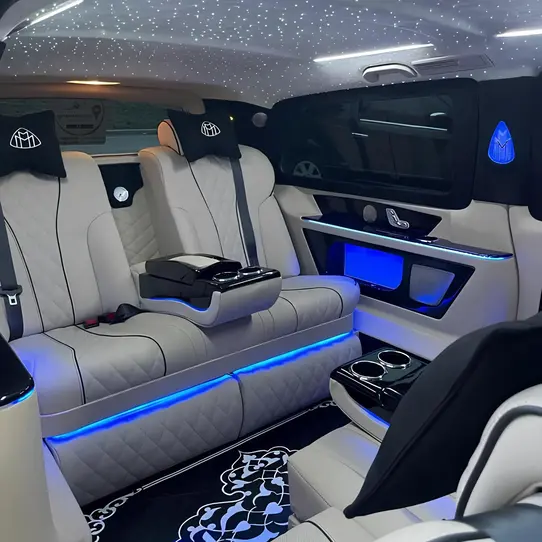 Interior of a luxury Mercedes Vito with white leather seats and starlight ceiling for VIP transfers in Istanbul.