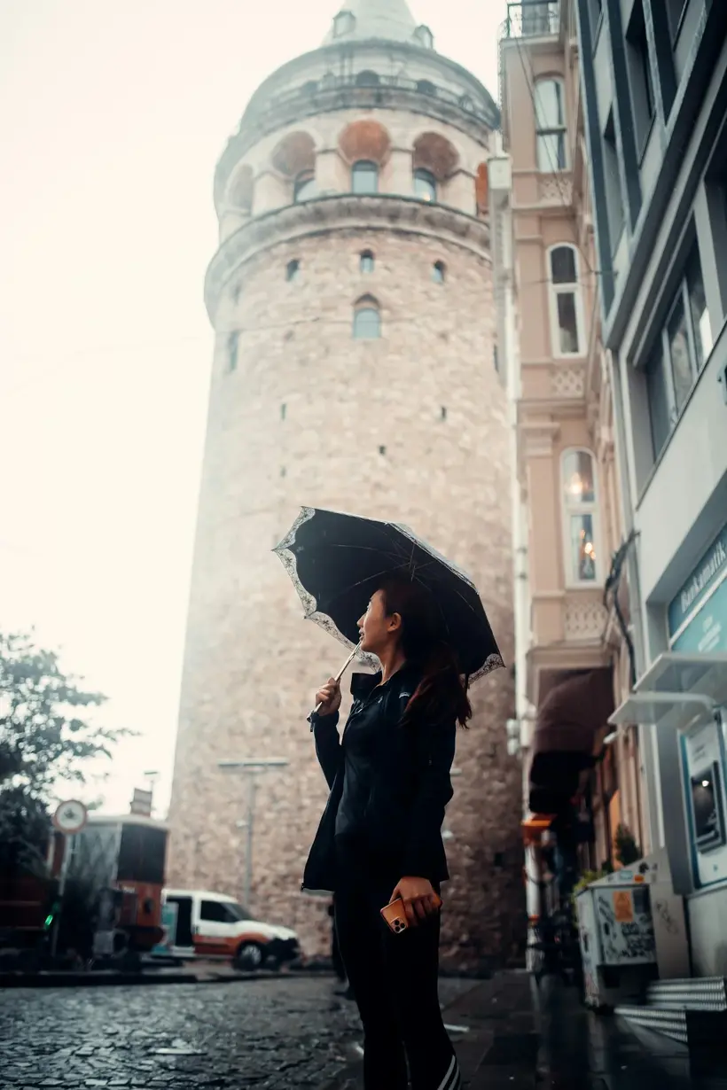 Rain on the street near Galata Tower in Beyoğlu, where steep cobbled lanes turn slippery in a downpour. File photo, not from the October 2026 floods. Photo: Ahmet Kahveci / Unsplash