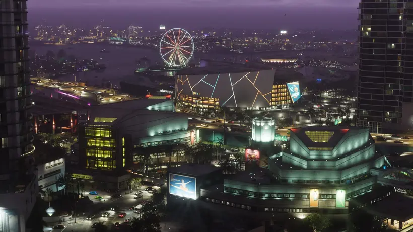 Vice City's waterfront arena district after dark, one of the official 4K screenshots published alongside the Extended Look - image: Rockstar Games